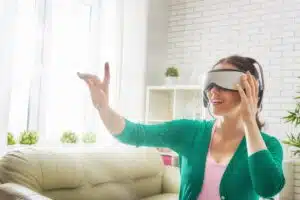 A woman using a virtual reality headset